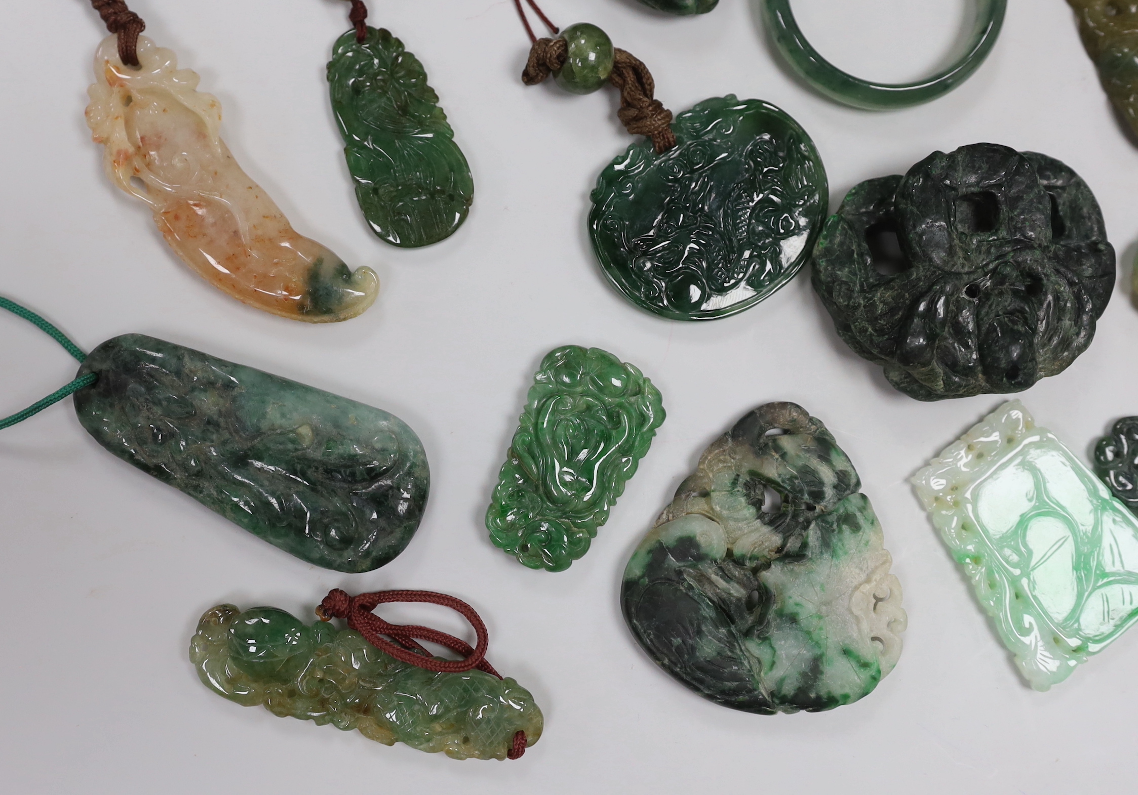 Fifteen Chinese jadeite carvings, longest approx 6.7cm